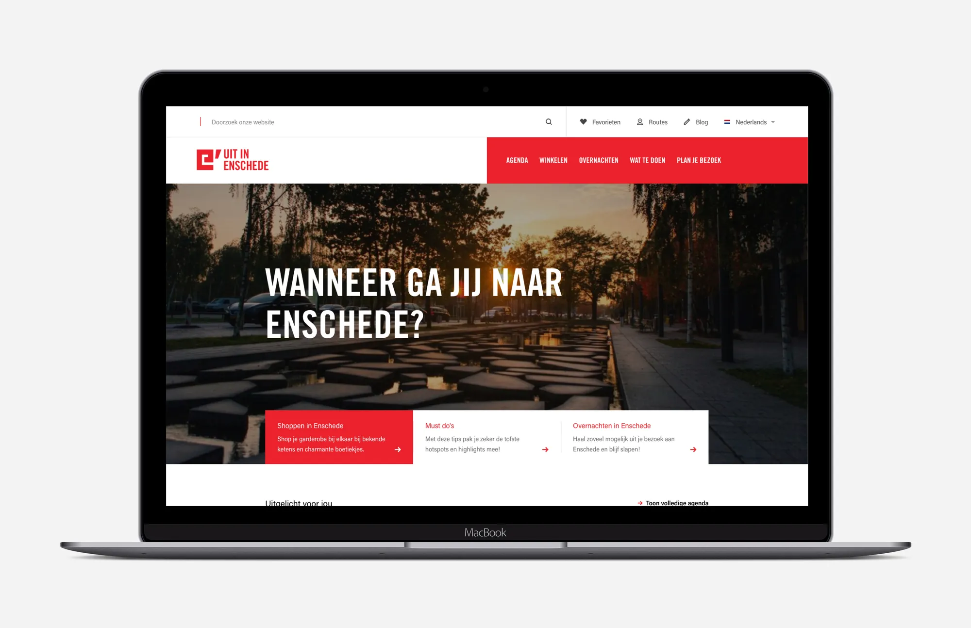 Laptop showing the Uit in Enschede homepage, headed ‘Wanneer ga jij naar Enschede?’ (when are you going to Enschede?)